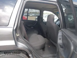 2004 Jeep Grand Cherokee Laredo z VIN 1J4GW48SX4C213322, wystawiony jako IAAI lot #41969362 z przebiegiem 273 876 mil mil oraz . Historia ofert i sprzedaży dostępna na DreamBid. Obrazek 8.