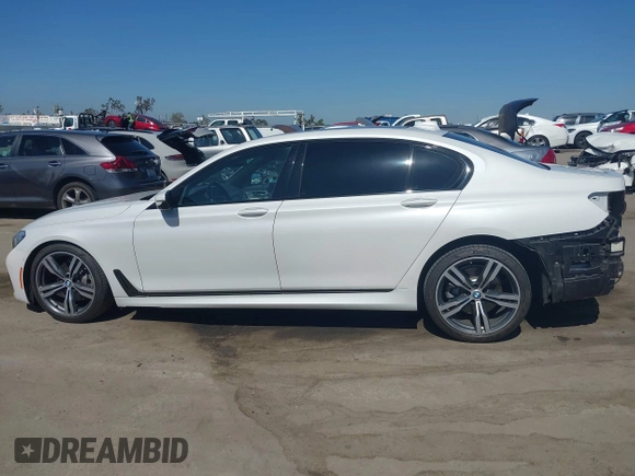 2019 BMW 7 Series 740i with VIN WBA7E2C53KB454816, listed as a IAAI auction lot 42539294 with 73,363 mi miles and . Bid and sale history available at DreamBid. Image 15.
