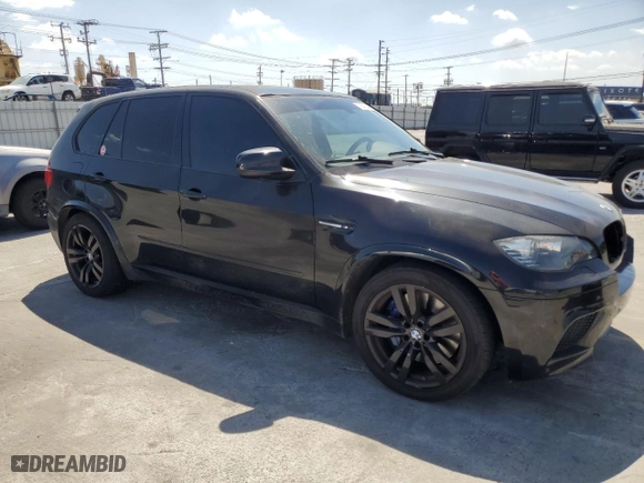 2013 BMW X5 M with VIN 5YMGY0C58DLL15879, listed as a Copart auction lot 71641344 with 101,652 mi miles and Salvage Title. Bid and sale history available at carsss.com. Image 4.