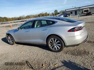 2013 Tesla Model S with VIN 5YJSA1DNXDFP04134, listed as a Copart auction lot 80529844 with 150,560 mi miles and Clean title. Bid and sale history available at DreamBid. Image 2.