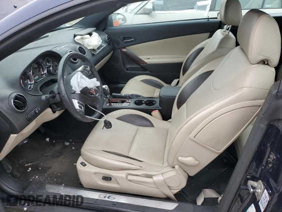 2009 Pontiac G6 GT 1SA z VIN 1G2ZH361394119883, wystawiony jako Copart lot #45003055 z przebiegiem 52 625 mil mil oraz Czysty tytuł • Clean title. Historia ofert i sprzedaży dostępna na DreamBid. Obrazek 7.