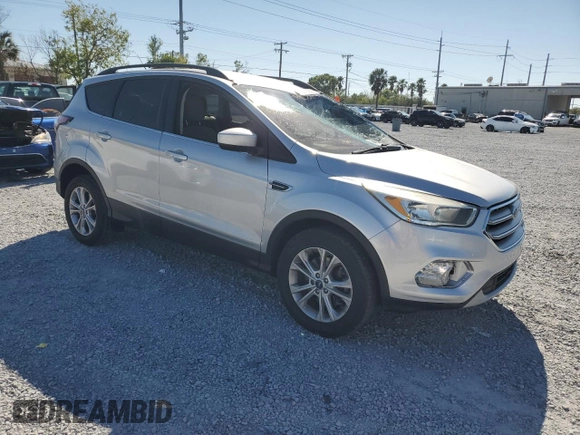 2018 Ford Escape SE with VIN 1FMCU0G98JUB49767, listed as a Copart auction lot 48140885 with 90,906 mi miles and Salvage Title. Bid and sale history available at carsss.com. Image 4.