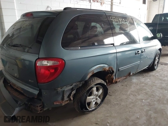 2005 Dodge Caravan SXT with VIN 2D4GP44L25R431882, listed as a IAAI auction lot 42484876 with 242,096 mi miles and . Bid and sale history available at DreamBid. Image 4.