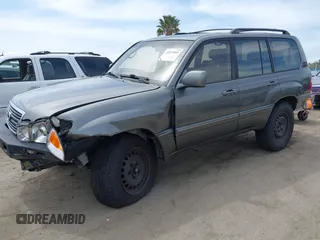 2001 Lexus LX 470 z VIN JTJHT00WX13509489, wystawiony jako IAAI lot #42227083 z przebiegiem 360 283 mil mil oraz . Historia ofert i sprzedaży dostępna na DreamBid. Obrazek 18.