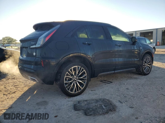 2024 Cadillac XT4 FWD Sport with VIN 1GYFZER47RF101186, listed as a Copart auction lot 79128454 with 10,499 mi miles and Salvage title. Bid and sale history available at DreamBid. Image 3.