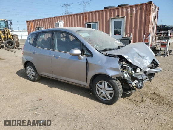 2007 Honda Fit z VIN JHMGD38497S025472, wystawiony jako Copart lot #55901095 z przebiegiem 120 216 mil mil oraz Szkoda całkowita • Salvage title. Historia ofert i sprzedaży dostępna na DreamBid. Obrazek 4.