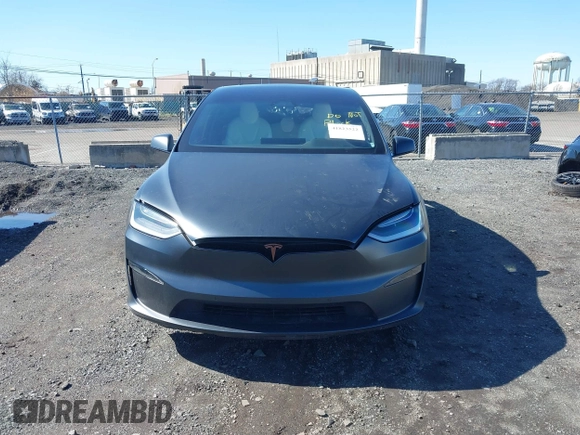 2022 Tesla Model X with VIN 7SAXCDE52NF345835, listed as a IAAI auction lot 41823522 with 24,401 mi miles and . Bid and sale history available at DreamBid. Image 11.
