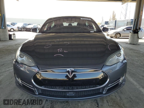 2014 Tesla Model S 60 with VIN 5YJSA1H17EFP63229, listed as a Copart auction lot 51776195 with 156,356 mi miles and Salvage Title. Bid and sale history available at DreamBid. Image 5.