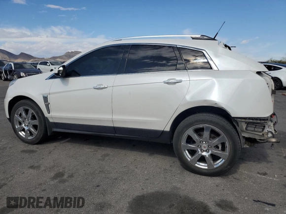2012 Cadillac SRX Performance Collection with VIN 3GYFNBE33CS540914, listed as a Copart auction lot 54787125 with 130,357 mi miles and Salvage title. Bid and sale history available at DreamBid. Image 2.