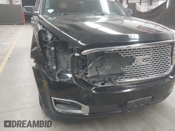 2016 GMC Yukon XL Denali with VIN 1GKS2HKJ8GR102213, listed as a IAAI auction lot 41818737 with 154,607 mi miles and . Bid and sale history available at DreamBid. Image 6.