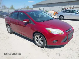 2014 Ford Focus SE with VIN 1FADP3F21EL209637, listed as a IAAI auction lot 42063454 with 148,359 mi miles. Bid and sale history available at carsss.com. Image 1.