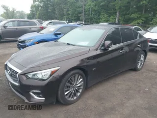 2019 Infiniti Q50 Luxe z VIN JN1EV7AR6KM550427, wystawiony jako IAAI lot #42225183 z przebiegiem 76 144 mil mil oraz . Historia ofert i sprzedaży dostępna na DreamBid. Obrazek 16.