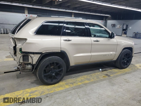 2014 Jeep Grand Cherokee Limited z VIN 1C4RJFBG1EC148908, wystawiony jako Copart lot #54311675 z przebiegiem 90 886 mil mil oraz Szkoda całkowita • Salvage title. Historia ofert i sprzedaży dostępna na DreamBid. Obrazek 3.