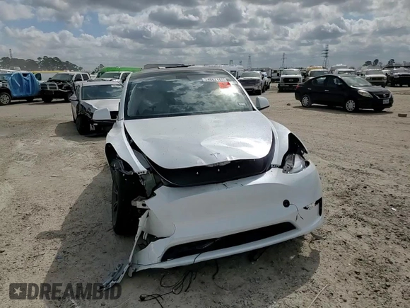 2024 Tesla Model Y Long Range with VIN 7SAYGDEE2RA335818, listed as a Copart auction lot 48821475 with 4,415 mi miles and Salvage Title. Bid and sale history available at DreamBid. Image 11.