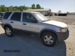 2002 Ford Escape XLT Choice with VIN 1FMCU04162KB00207, listed as a Copart auction lot 56414275 with 143,085 mi miles and Salvage title. Bid and sale history available at DreamBid. Image 4.