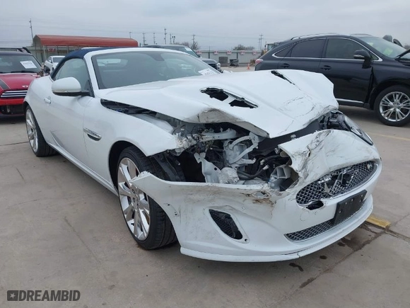 2014 Jaguar XK with VIN SAJWA4EC9EMB52042, listed as a IAAI auction lot 41635233 with 10,566 mi miles. Bid and sale history available at carsss.com. Image 1.
