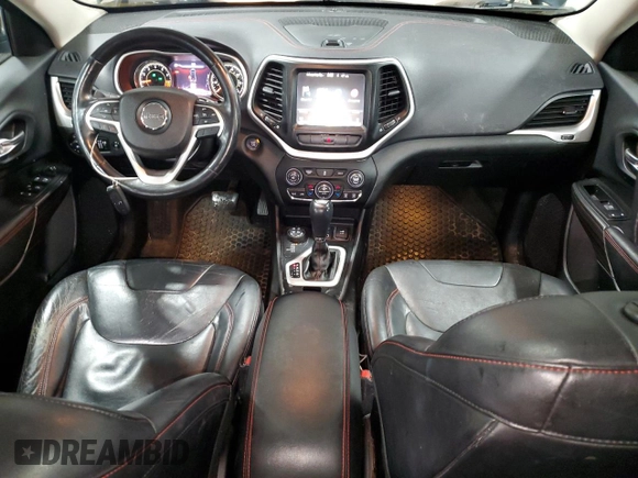 2014 Jeep Cherokee Trailhawk with VIN 1C4PJMBS5EW294212, listed as a Copart auction lot 88816885 with 151,779 mi miles and Salvage title. Bid and sale history available at DreamBid. Image 8.