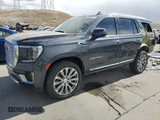 2021 GMC Yukon Denali with VIN 1GKS2DKL8MR318990, listed as a Copart auction lot 49886755 with 66,243 mi miles and Salvage Title. Bid and sale history available at carsss.com. Image 1.