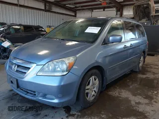 2007 Honda Odyssey EX-L z VIN 5FNRL38617B078923, wystawiony jako IAAI lot #42335122 z przebiegiem 154 352 mil mil oraz . Historia ofert i sprzedaży dostępna na DreamBid. Obrazek 2.