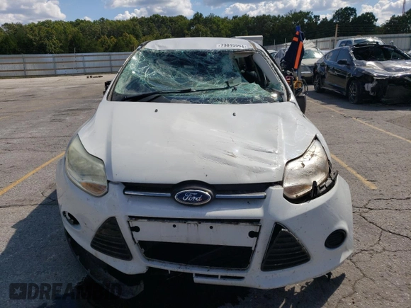 2013 Ford Focus S with VIN 1FADP3E2XDL326410, listed as a Copart auction lot 73015994 with 65,900 mi miles and Salvage Title. Bid and sale history available at carsss.com. Image 5.