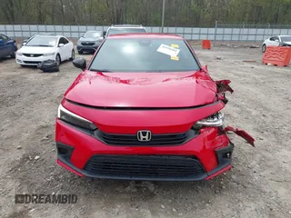 2022 Honda Civic Sport z VIN 2HGFE2F51NH534607, wystawiony jako IAAI lot #41938903 z przebiegiem 32 554 mil mil oraz . Historia ofert i sprzedaży dostępna na DreamBid. Obrazek 12.
