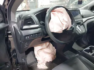 2024 Honda Odyssey Touring z VIN 5FNRL6H80RB044915, wystawiony jako IAAI lot #41921539 z przebiegiem 13 425 mil mil oraz . Historia ofert i sprzedaży dostępna na DreamBid. Obrazek 21.