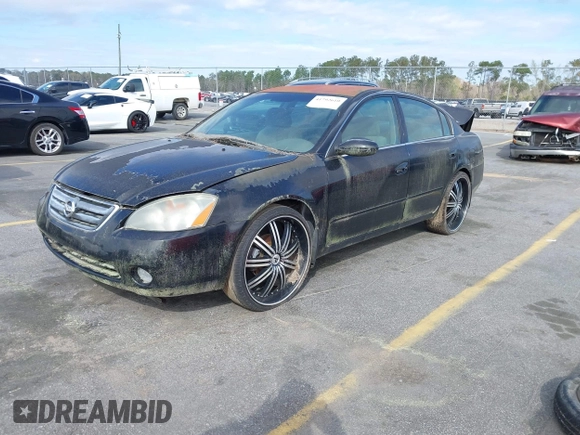 2002 Nissan Altima S with VIN 1N4AL11D52C178433, listed as a IAAI auction lot 41792610 with 216,659 mi miles. Bid and sale history available at carsss.com. Image 2.