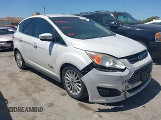 2013 Ford C-Max SEL z VIN 1FADP5CU7DL521834, wystawiony jako IAAI lot #42360301 z przebiegiem 176 186 mil mil oraz . Historia ofert i sprzedaży dostępna na DreamBid. Obrazek 1.