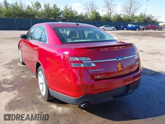 2013 Ford Taurus SEL with VIN 1FAHP2E87DG168603, listed as a IAAI auction lot 41942917 with 161,293 mi miles. Bid and sale history available at carsss.com. Image 3.