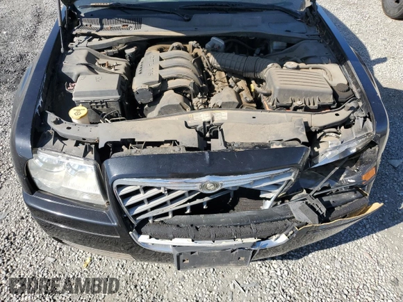 2009 Chrysler 300 LX with VIN 2C3KA43D59H529761, listed as a Copart auction lot 44260275 with 135,802 mi miles and Salvage Title. Bid and sale history available at carsss.com. Image 11.