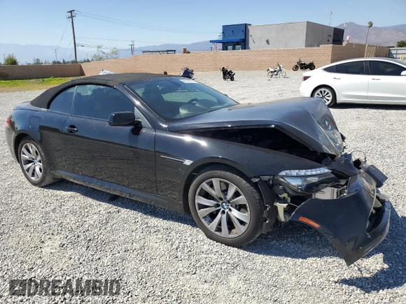 2009 BMW 6 Series 650i with VIN WBAEB53569C224337, listed as a Copart auction lot 68148974 with 75,057 mi miles and Salvage Title. Bid and sale history available at carsss.com. Image 4.