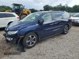2019 Honda Odyssey Touring with VIN 5FNRL6H8XKB027156, listed as a Copart auction lot 60735455 with 100,044 mi miles and Salvage title. Bid and sale history available at DreamBid. Image 1.
