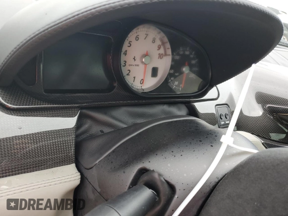2010 Ferrari 599 z VIN ZFF60FCA0A0173683, wystawiony jako Copart lot #74913514 z przebiegiem Nie podano mil oraz Szkody całkowita. Historia ofert i sprzedaży dostępna na DreamBid. Obrazek 9.