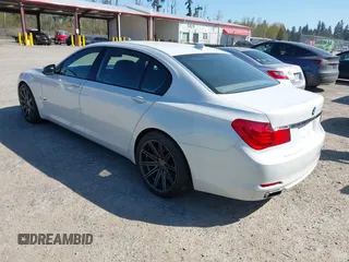 2009 BMW 7 Series 750Li with VIN WBAKB83549CY59299, listed as a IAAI auction lot 42040718 with 129,236 mi miles. Bid and sale history available at carsss.com. Image 3.