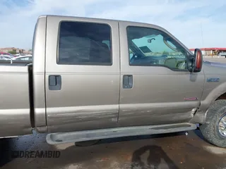 2003 Ford F-350 XL z VIN 1FTSW31P63EC46630, wystawiony jako IAAI lot #41699789 z przebiegiem 129 633 mil mil oraz . Historia ofert i sprzedaży dostępna na DreamBid. Obrazek 13.