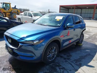 2019 Mazda CX-5 Touring with VIN JM3KFACM9K0686951, listed as a IAAI auction lot 41870797 with 66,303 mi miles. Bid and sale history available at carsss.com. Image 18.