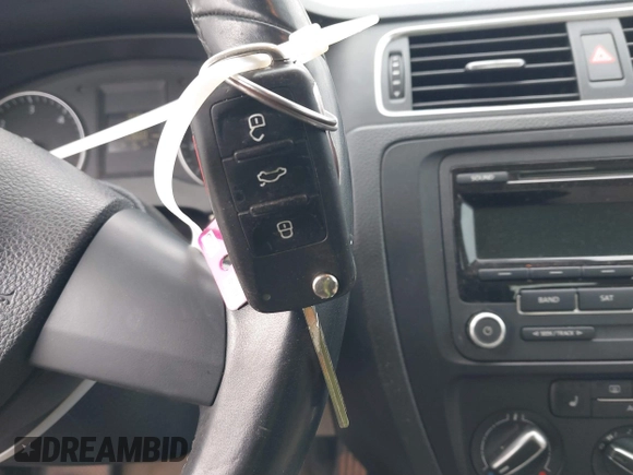 2012 Volkswagen Jetta TDI w/Premium with VIN 3VWLL7AJXCM073394, listed as a IAAI auction lot 41602574 with 159,668 mi miles and . Bid and sale history available at DreamBid. Image 11.