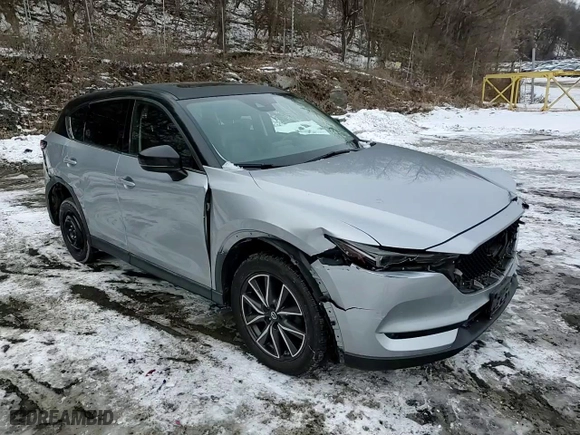 2017 Mazda CX-5 Grand Touring with VIN JM3KFBDL2H0189468, listed as a Copart auction lot 44898875 with 66,643 mi miles and Salvage Title. Bid and sale history available at carsss.com. Image 14.
