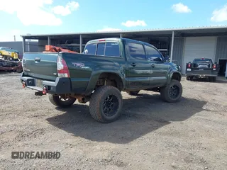 2012 Toyota Tacoma z VIN 3TMLU4EN6CM091483, wystawiony jako IAAI lot #41464391 z przebiegiem 124 204 mil mil oraz . Historia ofert i sprzedaży dostępna na DreamBid. Obrazek 4.