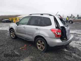 2014 Subaru Forester 2.5i Premium with VIN JF2SJAEC5EH500034, listed as a IAAI auction lot 41308759 with 171,980 mi miles. Bid and sale history available at carsss.com. Image 3.
