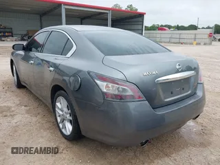 2014 Nissan Maxima S z VIN 1N4AA5AP7EC463582, wystawiony jako IAAI lot #42194403 z przebiegiem 153 719 mil mil oraz . Historia ofert i sprzedaży dostępna na DreamBid. Obrazek 3.