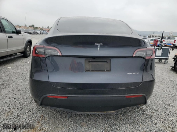 2024 Tesla Model Y Long Range with VIN 7SAYGDEE9RA243377, listed as a Copart auction lot 50601185 with 7,691 mi miles and Salvage Title. Bid and sale history available at carsss.com. Image 6.