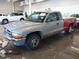 1998 Dodge Dakota SLT z VIN 1B7GL22YXWS762222, wystawiony jako IAAI lot #41250956 z przebiegiem 195 027 mil mil oraz . Historia ofert i sprzedaży dostępna na DreamBid. Obrazek 14.