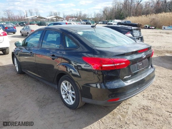 2015 Ford Focus SE with VIN 1FADP3F20FL296173, listed as a IAAI auction lot 41899632 with 136,572 mi miles. Bid and sale history available at carsss.com. Image 3.