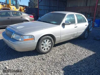2005 Mercury Grand Marquis LS Premium with VIN 2MEFM75W05X636896, listed as a IAAI auction lot 41636318 with 182,257 mi miles. Bid and sale history available at carsss.com. Image 17.