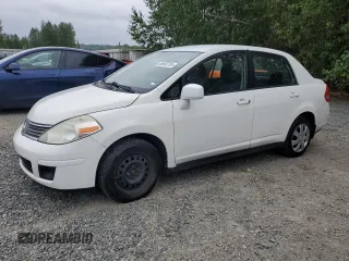 2009 Nissan Versa S z VIN 3N1BC11EX9L500718, wystawiony jako Copart lot #60968735 z przebiegiem 139 927 mil mil oraz Czysty tytuł • Clean title. Historia ofert i sprzedaży dostępna na DreamBid. Obrazek 1.