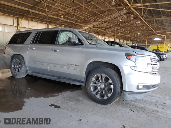 2018 Chevrolet Suburban Premier with VIN 1GNSCJKC7JR104888, listed as a Copart auction lot 68027604 with 69,632 mi miles and Salvage title. Bid and sale history available at DreamBid. Image 4.