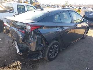 2022 Toyota Prius L Eco with VIN JTDKAMFUON3182683, listed as a IAAI auction lot 41818975 with 23,278 mi miles. Bid and sale history available at carsss.com. Image 4.