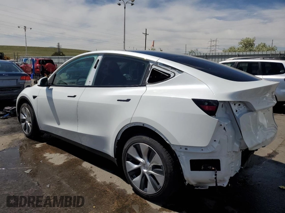 2022 Tesla Model Y Long Range with VIN 7SAYGAEE4NF534588, listed as a Copart auction lot 53274995 with 20,768 mi miles and Salvage Title. Bid and sale history available at DreamBid. Image 2.