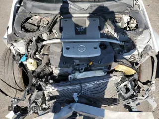 2008 Nissan 350Z Touring z VIN JN1BZ34EX8M753158, wystawiony jako Copart lot #57711145 z przebiegiem 113 142 mil mil oraz Szkoda całkowita • Salvage title. Historia ofert i sprzedaży dostępna na DreamBid. Obrazek 11.